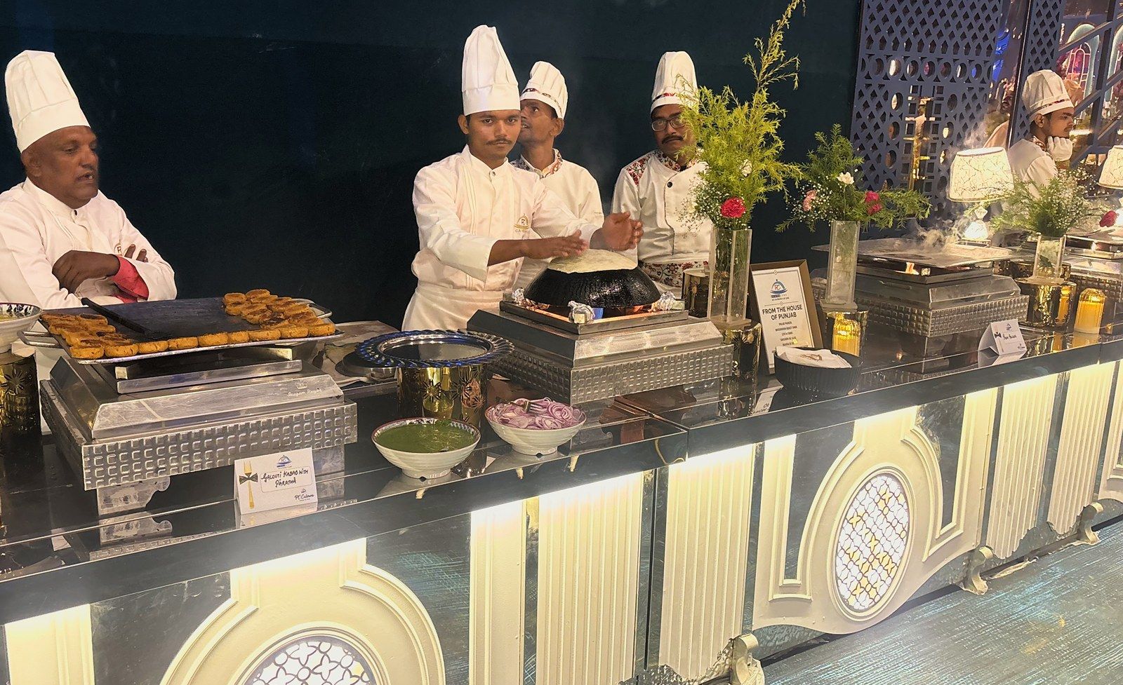 Chefs at work at the From the House of Lucknow counter